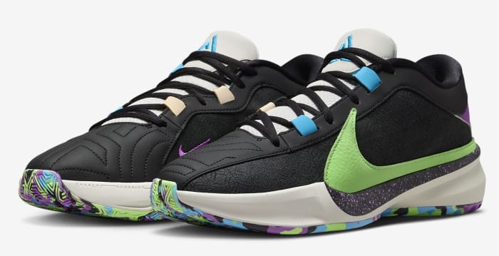 Side view of Giannis Antetokounmpo's black, green, and blue Nike shoes.